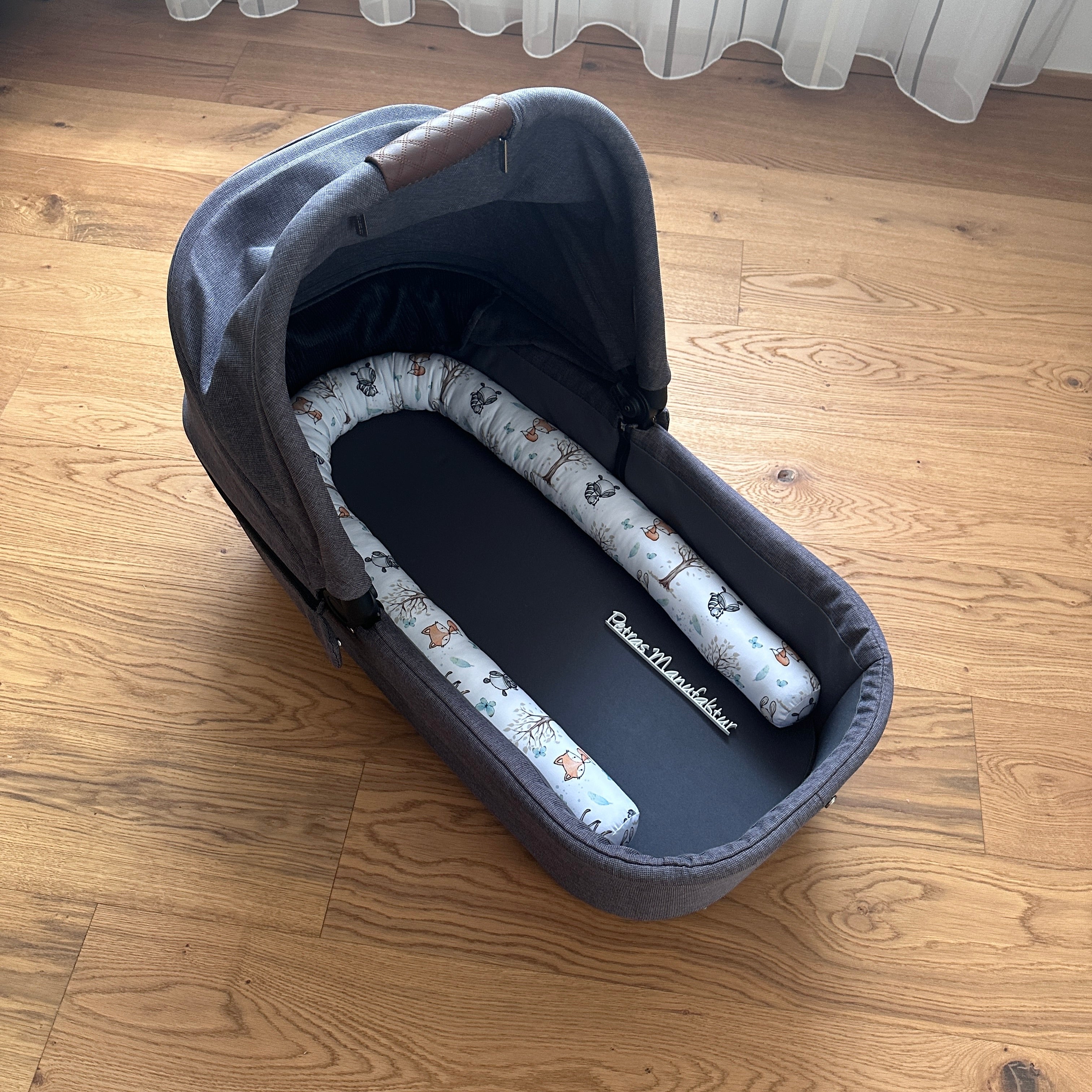 Rolle/Schlange für den Kinderwagen